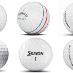 Six golf balls from major golf ball manufacturers.