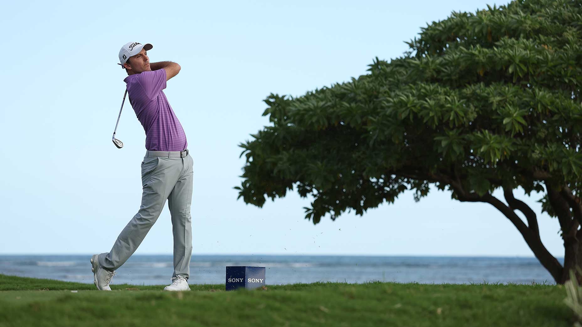 Russell Henley hits a tee shot at the Sony Open.