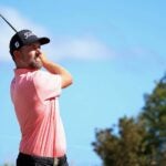 Webb Simpson hits shot during golf tournament