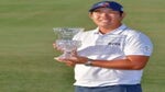 Byeong Hun An poses with trophy after winning Korn Ferry Tour event