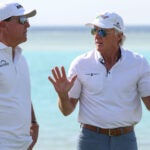 phil mickelson talks to greg norman