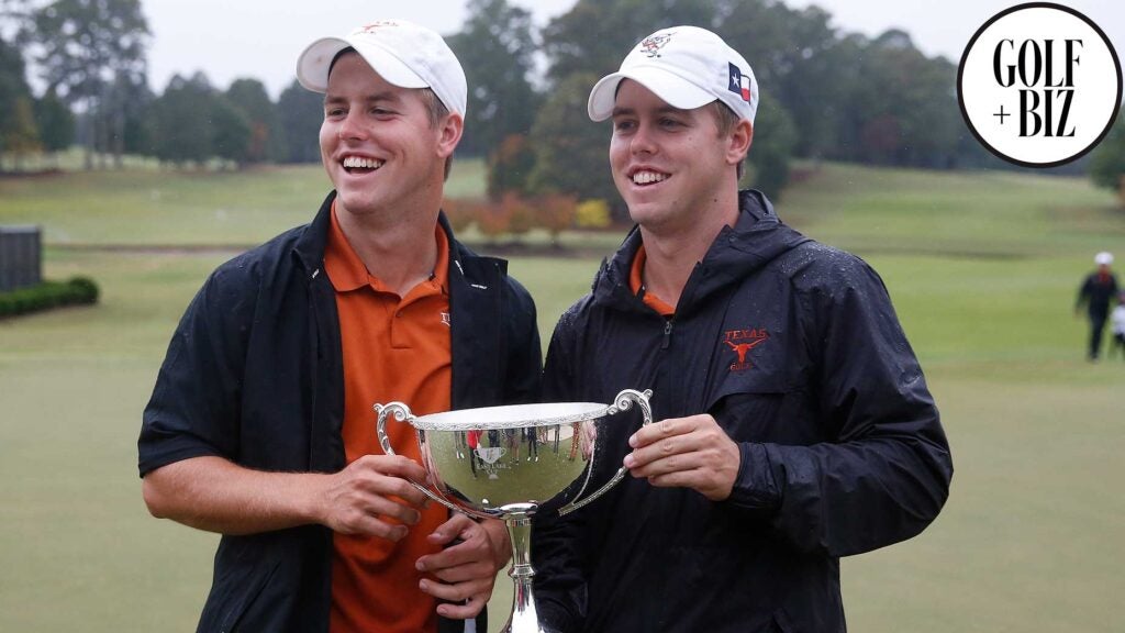 Pierceson and Parker Coody of the Texas men's golf team pose with the East Lake Cup in 2019.
