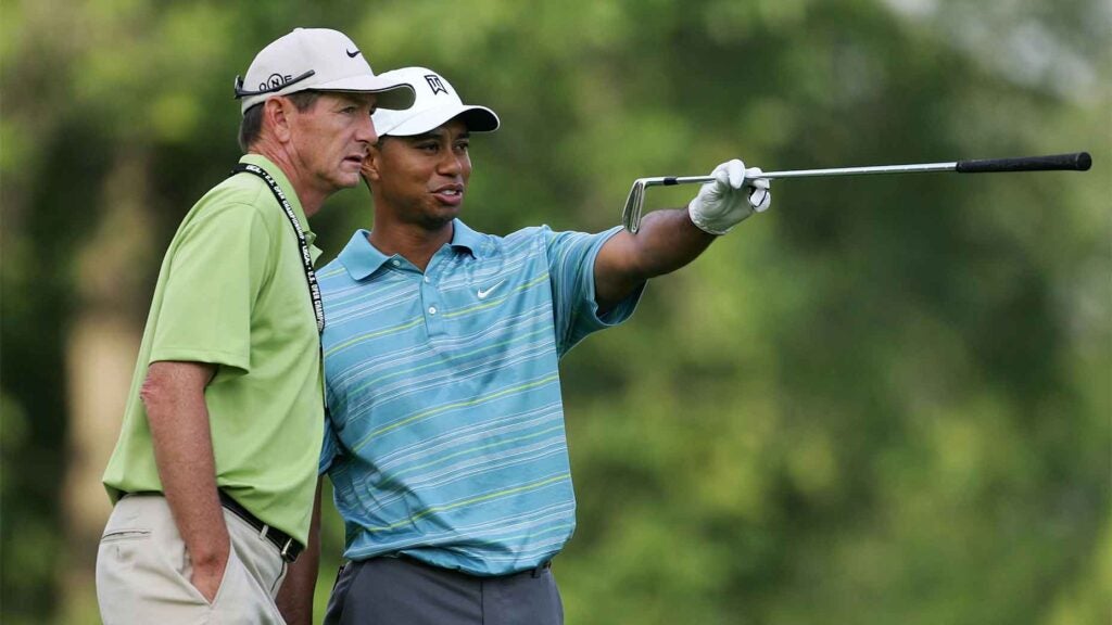hank haney chats with tiger woods