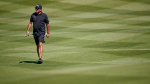 Phil Mickelson walks down the fairway during a practice round at Royal Greens Golf & Country Club on Tuesday.