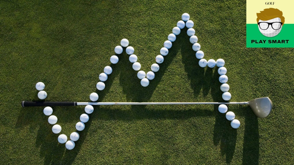 golf balls and golf club arranged in graph on grass