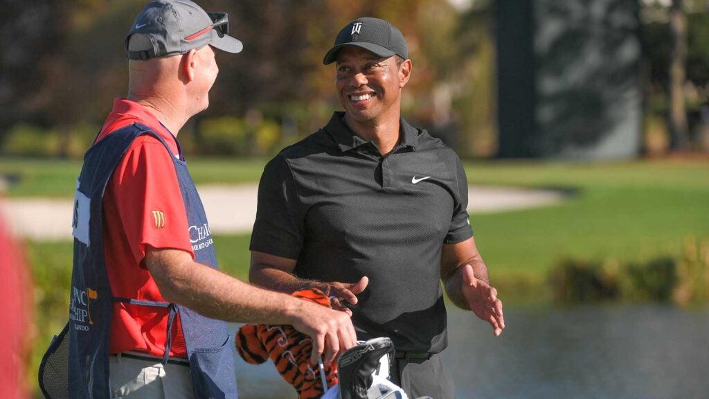 Tiger Woods and Joe LaCava at the PNC Championship.