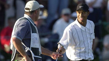 Tiger Woods and Steve Williams after the famous "Better than most" putt on No. 17 green at TPC Sawgrass.