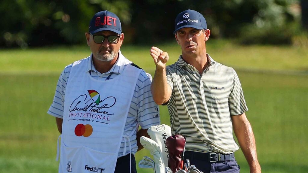 Billy Horschel talks with caddie durign 2022 Arnold Palmer Invitational