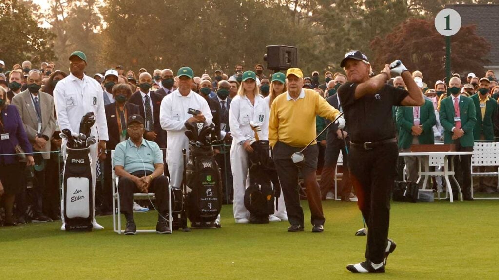 Honorary starter and Masters champion Gary Player of South Africa plays his opening tee shot on the first tee as honorary starter Lee Elder of the United States and honorary starter and Masters champion Jack Nicklaus look on during the opening ceremony prior to the start of the first round of the Masters at Augusta National Golf Club on April 08, 2021 in Augusta, Georgia