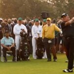 Honorary starter and Masters champion Gary Player of South Africa plays his opening tee shot on the first tee as honorary starter Lee Elder of the United States and honorary starter and Masters champion Jack Nicklaus look on during the opening ceremony prior to the start of the first round of the Masters at Augusta National Golf Club on April 08, 2021 in Augusta, Georgia