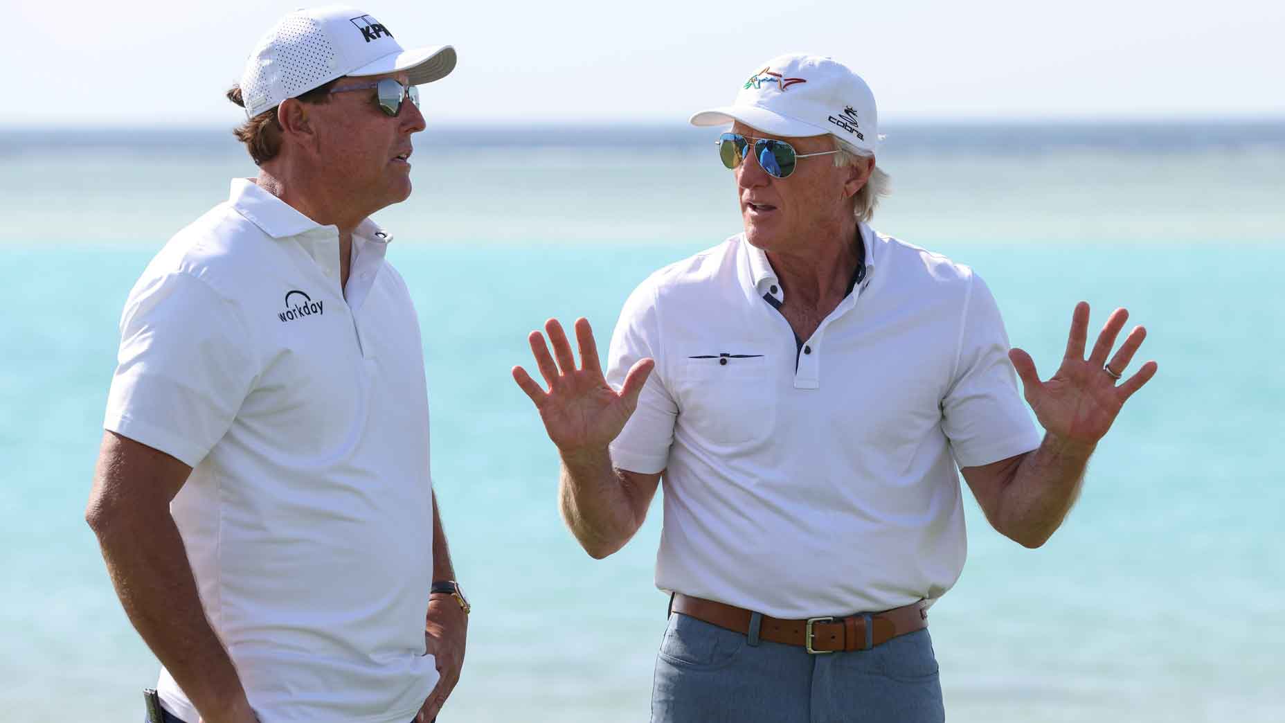 greg norman talks to phil mickelson
