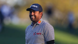 PONTE VEDRA BEACH, FL - MARCH 13: Anirban Lahiri of India smiles on the ninth green during the third round of THE PLAYERS Championship on THE PLAYERS Stadium Course at TPC Sawgrass on March 13, 2022, in Ponte Vedra Beach, FL. (Photo by James Gilbert/PGA TOUR via Getty Images)