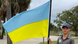 misha golod holding ukrainian flag