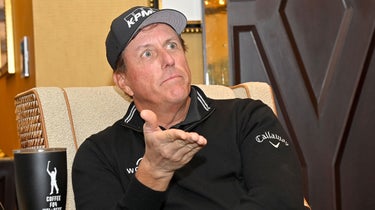 phil mickelson talks to reporters