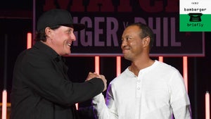 tiger woods and phil mickelson at the match