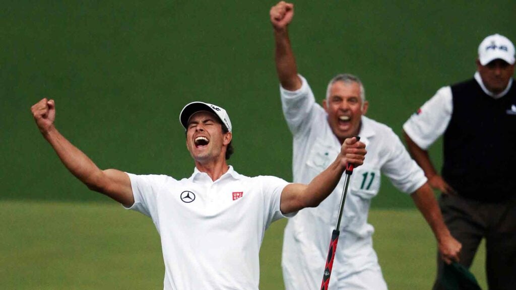 Adam Scott raises arms after winning 2013 Masters