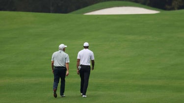 Tiger Woods and Fred Couples on Wednesday at the Masters.