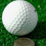 quarter and golf ball