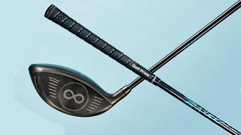 A driver head and a driver shaft against a blue background