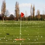 A driving range on a golf course.