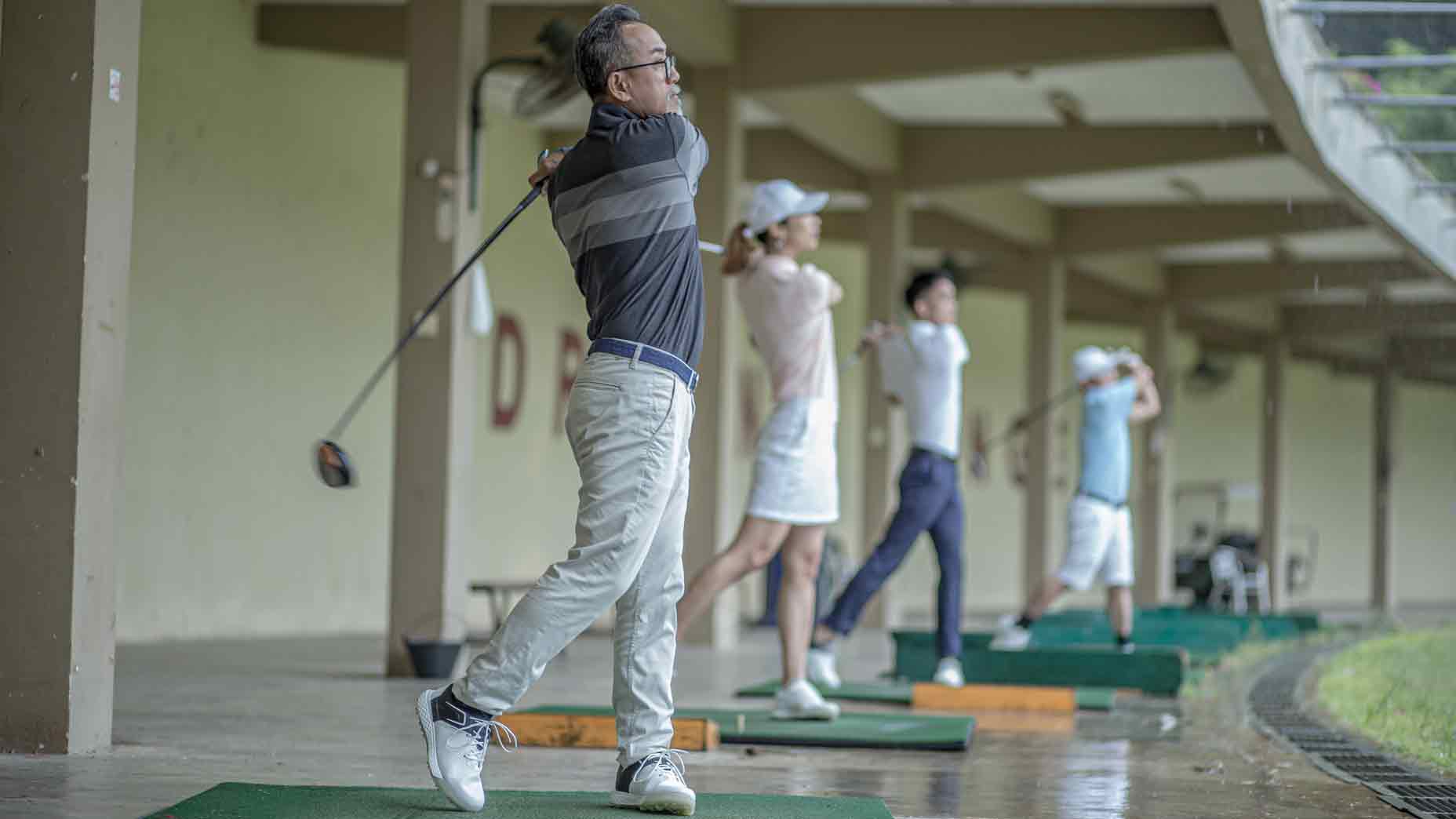 golfers on range