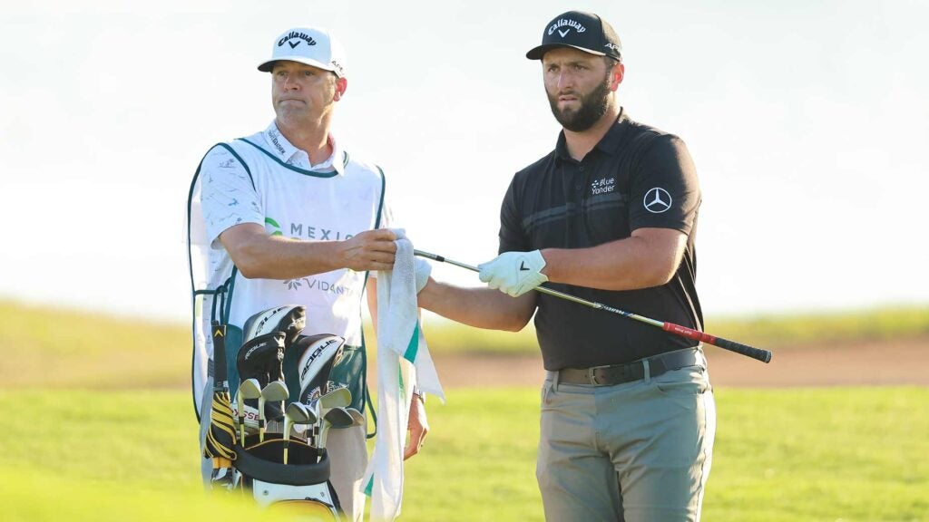 Jon Rahm discusses shot with his caddie at 2022 Mexico Open