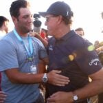 Jon Rahm congratulates Phil Mickelson at 2021 PGA Championship