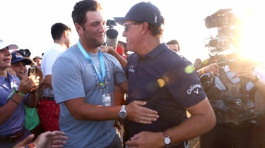 Jon Rahm congratulates Phil Mickelson at 2021 PGA Championship