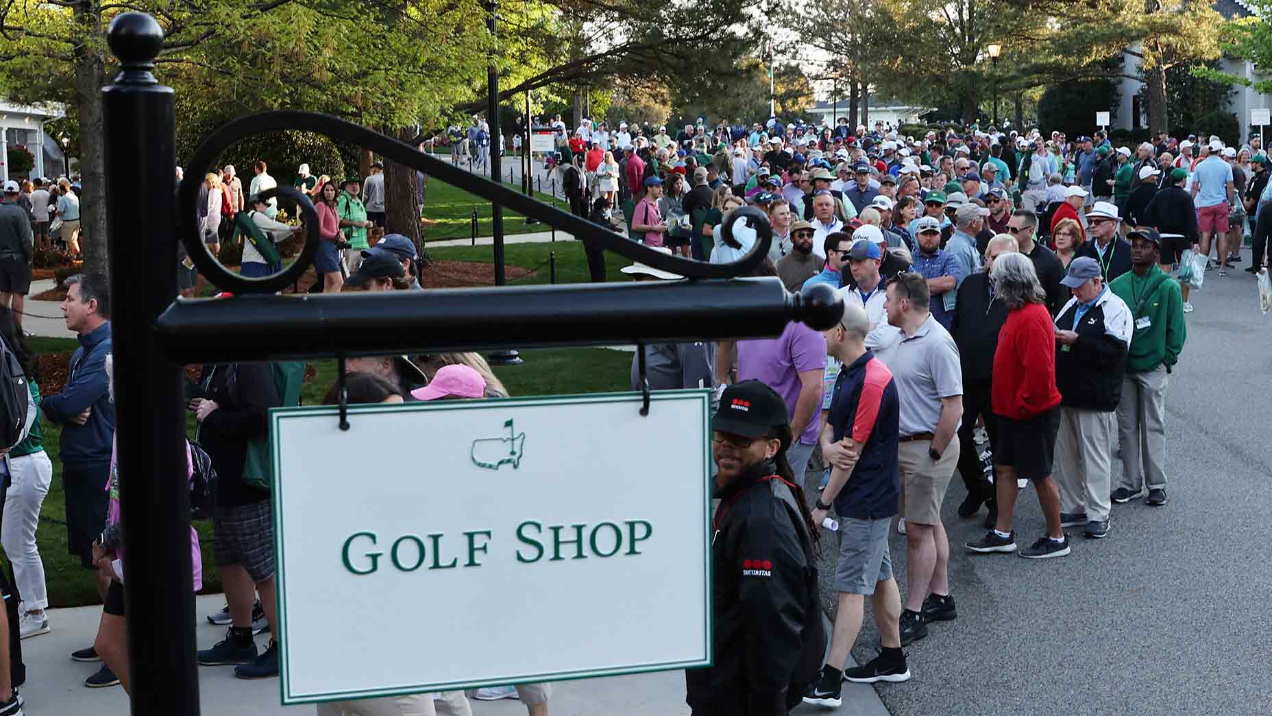 Customers line up to enter the Masters Golf Shop.