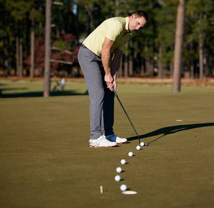 Change your routine Why you should putt with your head up