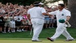 Bubba Watson (L) of the United States hugs his caddie Ted Scott after winning his sudden death playoff on the second playoff hole to win the 2012 Masters Tournament by one stroke at Augusta National Golf Club on April 8, 2012 in Augusta, Georgia.
