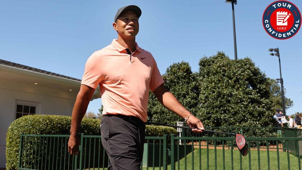 Tiger Woods walks from the practice area at Augusta National Golf Club on Sunday.