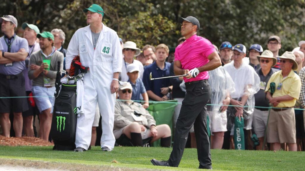 Tiger Woods hits shot during first round of 2022 Masters