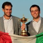 edoardo molinari and francesco molinari with italian flag and ryder cup trophy