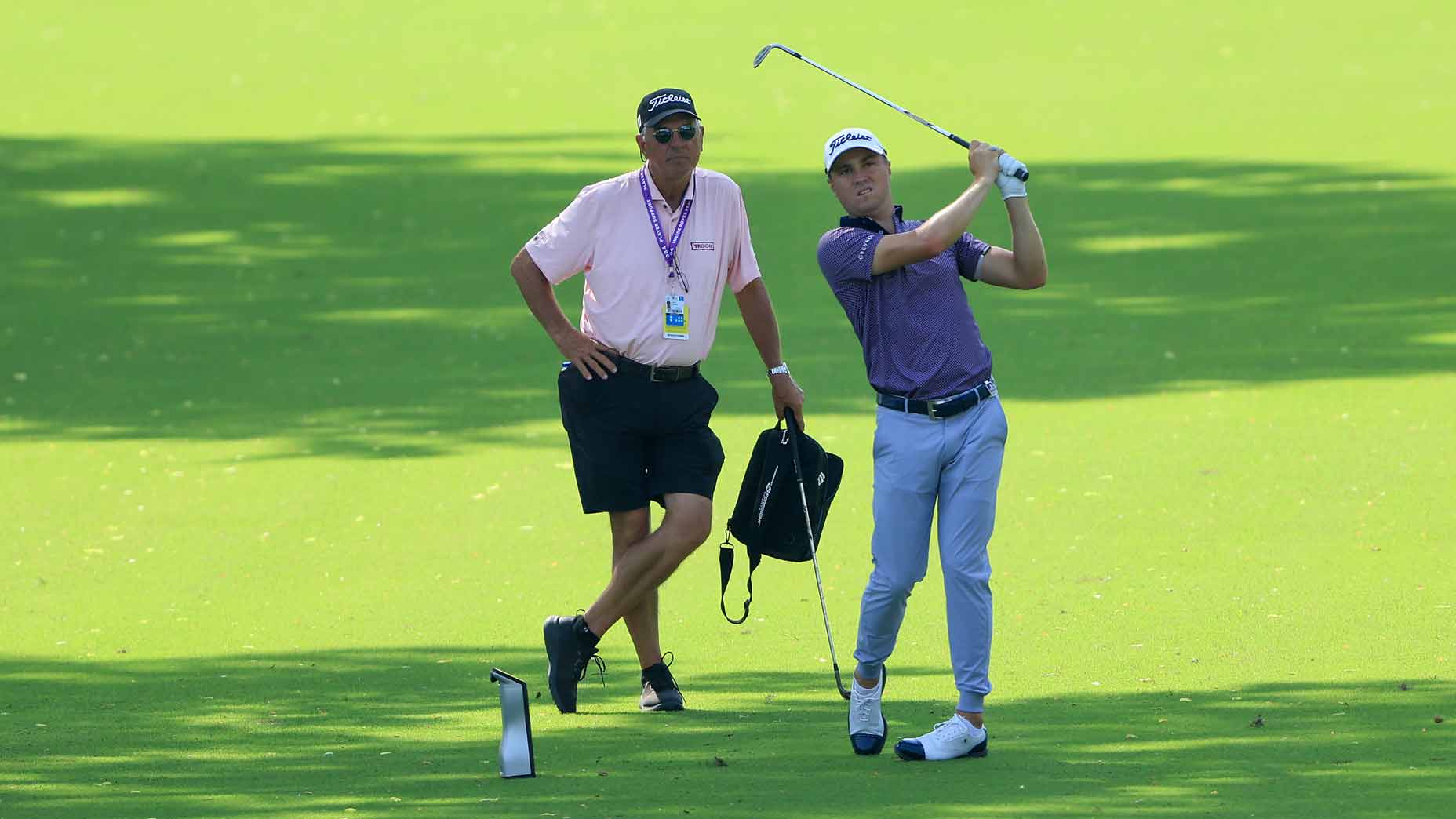 Justin Thomas and his father-slash-swing-coach Mike.