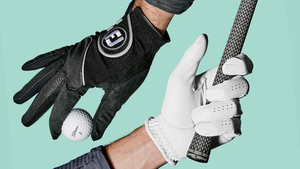 Two hands wearing FootJoy golf gloves