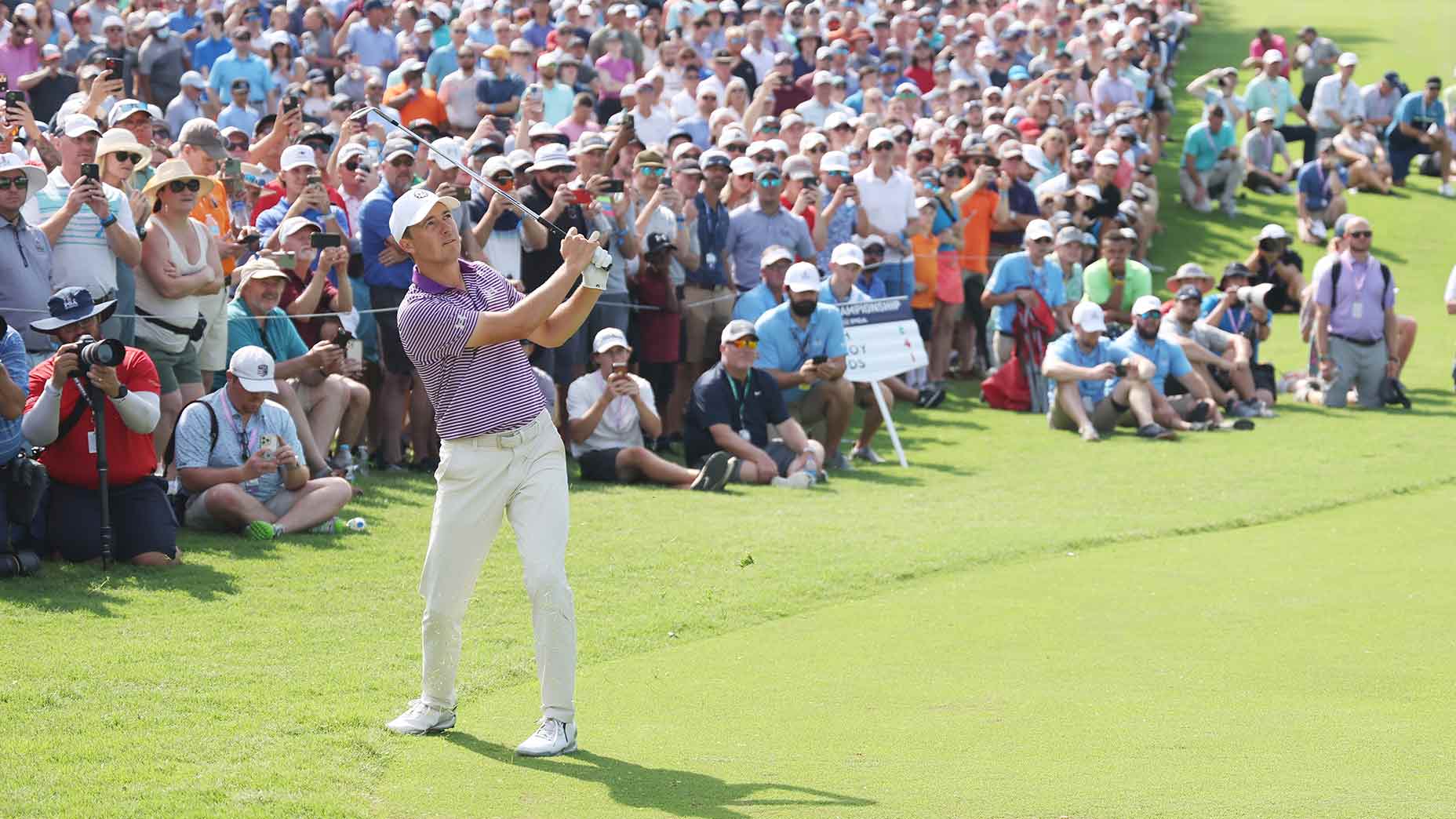 Jordan Spieth chips onto the green during the opening round of the PGA on Thursday.