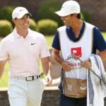 Rory McIlroy walks with caddie during 2021 Wells Fargo Championship