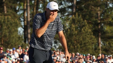 Scottie Scheffler covers his mouth after missing a short putt on the final hole of the 2022 Masters.