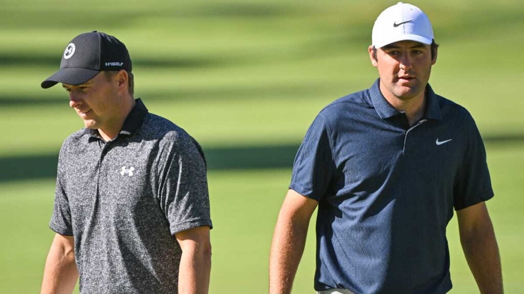 Scottie Scheffler and Jordan Spieth walk towards the 17th green during the first round of the Genesis Invitational at Riviera Country Club on February 17, 2022 in Pacific Palisades, California