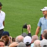 Tiger Woods and Justin Thomas walk during practice round at 2022 Masters