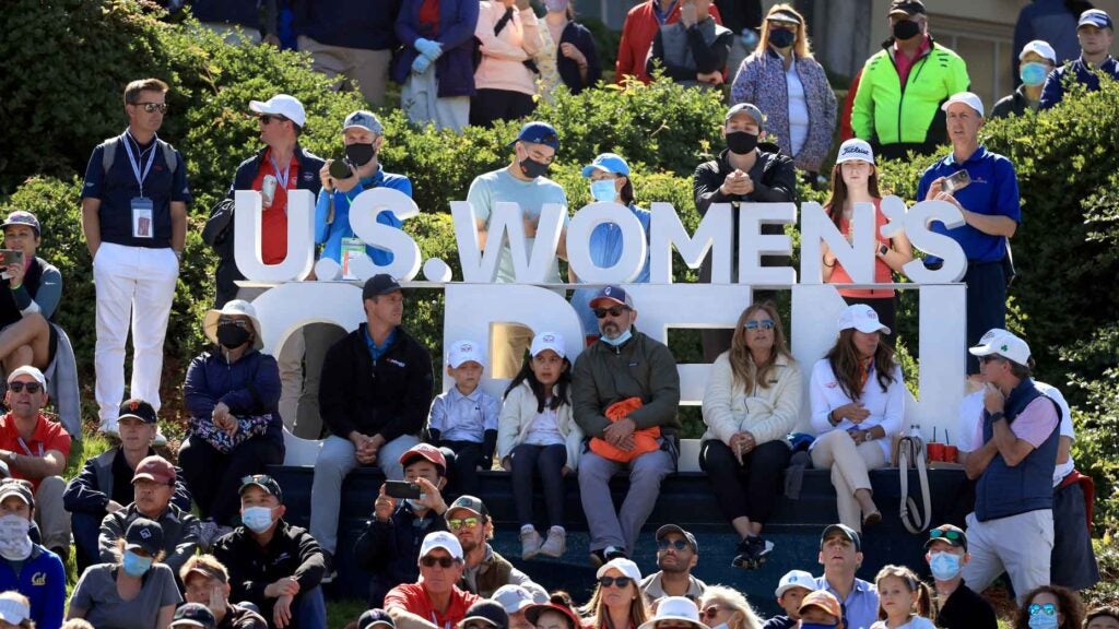 Fans around U.S. Women's Open sign at Olympic Club
