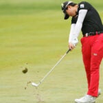 Golfer Yuka Saso hits shot during tournament