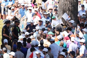 Phil Mickelson signs autographs for a swarm of people at the 2022 U.S. Open