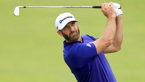 Dustin Johnson watches an approach during the first round of the U.S. Open.