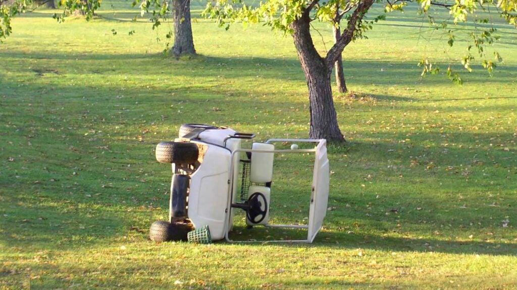 tipped over golf cart