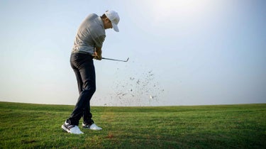 golfer swings