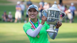 minjee lee poses with trophy