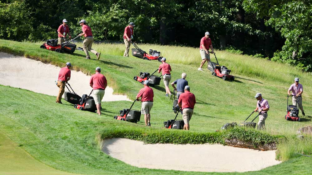 Members of the grounds staff work on the course during a practice round at the 2022 U.S. Open at The Country Club in Brookline, Mass. on Monday, June 13, 2022. (Jeff Haynes/USGA)