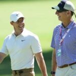 Rory McIlroy walks with coach at 2022 U.S. Open